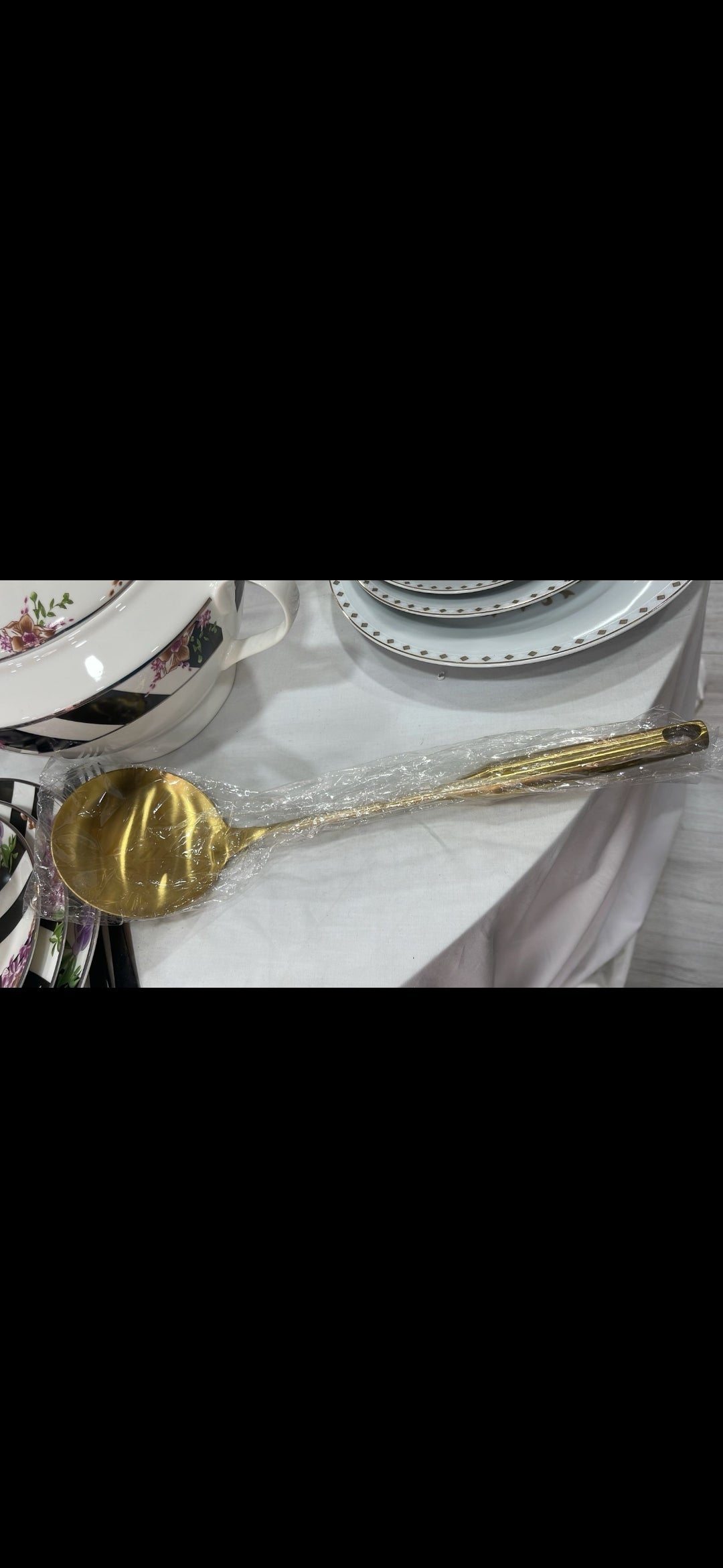 Louche dore grande taille