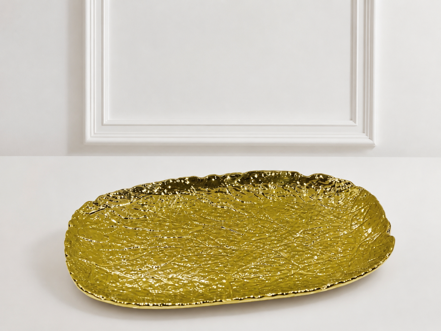 Assiette ovale en doré _ par Unité